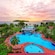 Elevated view of Holiday Villa Resort & Beachclub Langkawi with swimming pools, tropical gardens and island views